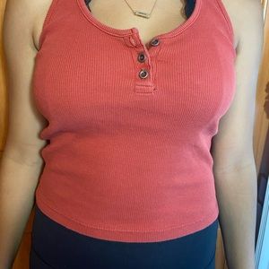 Orange tank with buttons